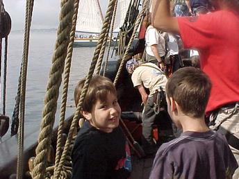 Pirate Ship Battle - This is my son Kyle sailing on the Lady Washington during a mock 'battle' with another 'pirate ship'.  They shot off real cannons (without the cannon balls) and it was very loud and smoky.  An eleven year old boy's dream!