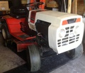 Montgomery Ward Mid-70S? Lawn Tractor - 11hp Briggs & Stratton 3 speed engine. Guy I bought it from could not tell  me the year. Except perhaps the battery, it is all original. Runs like a top  and cuts well still. I am on summer number 3, and have definitely got my  140 bucks out of it!