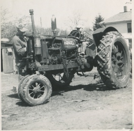 Farmall F-20 Or F-30 - In about 1948, I'm in the seat of grandpa's tractor.  Trying to figure out what it was, but going by spokes in  front and rear tires does't seem to help, as they  apparently had many different configurations.  I don't  know if the 4 spoke steering wheel makes a difference.