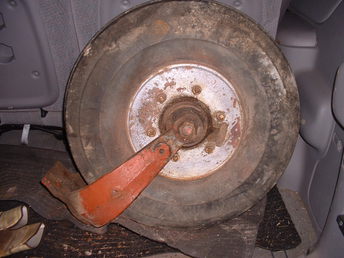 Case Single Front Wheel??? - Bought a Farmall C with this single front wheel and knew it wasn't correct for a Farmall. I think it's maybe Case but want to know for sure. Known specs; has a 7.50 x 10 tire, on the cast hub there are 2 part numbers. Valve stem side is either 6181A or 5181A, the other side is 5182A. Has a round machined mounting pad with 4 bolt holes in a 3 1/8 center to center pattern