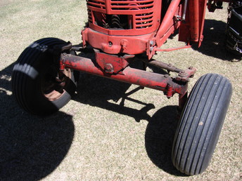 1944 Farmall M - I need to replace the inner and outer tie rod ends and the adjustment sleeves on the front axle, my problem is I don't know which wide front I have, there aren't any tags or stamped numbers for identification, the adjustment sleeves don't resemble anything for a Schwartz or a Spee-Co axle that I can find, maybe this axle is a newer IHC axle from a SM, 400 or 560 or larger tractor, I don't know. I thank you in advance for your help.