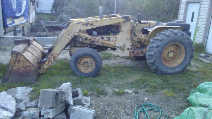 Allis Chalmers Loader Model # - hello , I've just got this tractor/loader  and I'm asking for help identifying it ,it's an Allis Chalmers 4 cyl gas, don't know year , model serial # and need to buy some parts . any help will be greatly appreciated