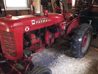 Farmall Tractor - Need help identifying this old tractor. It's  obviously a Farmall. Super A - is that the model? And  can anyone give me an approximate year and value?  This is part of my father-in-law's estate and we need  to sell it. But before we do, we need to know what  'it' is and how much to ask. Many thanks.