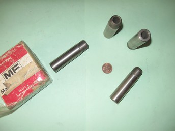 Unknown Valve Guides - Possibly an Agco part. Picked up at closed Massey  dealership. Penny for size comparison. Anyone have  an ideal what model they may fit? There are 8 in the  box.