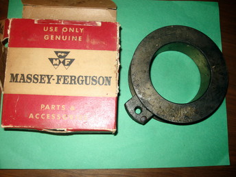 Unknown Pulley?? - Possibly an Agco part. Picked up at closed Massey  dealership. Anyone have an ideal what model it may  fit? Quite a heavy part about 5 inches in diameter,  and maybe 1 inch thick. Has a groove around edge for  a possible cable?