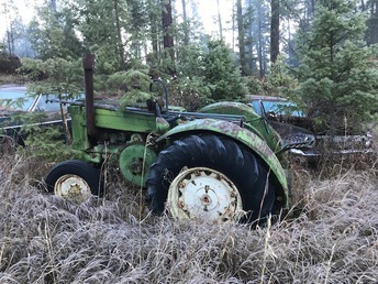 John Deere - This is a tractor I grew up with and is in my dad's estate.  I have no idea how to figure out what it is, who might want it, and what it is worth.  Any help would be appreciated.