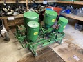 John Deere 2 Row Planter  - Looked at a bunch of photos, trying to find the model  number.  I have broken part on the axle trying to see  if I can find the part.