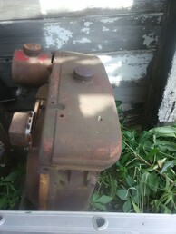 ???? - I need to ID this item.  I was told it  is Farmall but I have no idea if it is -  what year it is - what the parts are or  the value.  I'd appreciate any help -  thank you.