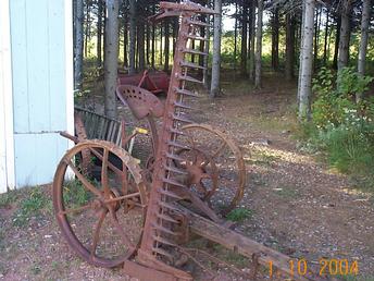 Hay Mower - hay mower from my grandfathers farm, only word on it is Giant- cast on an axle. Someone told me the tool-box cover said Cockshutt, but this is no longer with the mower, so i'm not sure. can anyone identify, and tell me a color scheme so I can re-paint close to original?