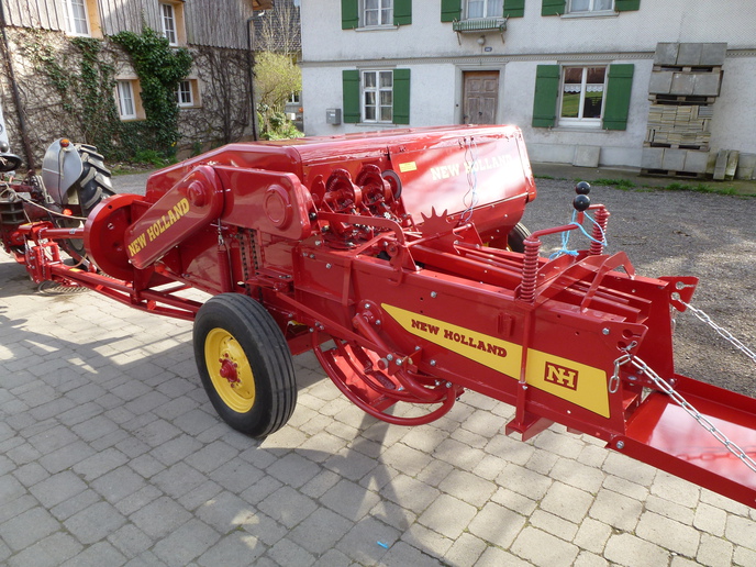 NH Super Hayliner 69       1959 - I bought the baler as a wreck. Every bearing was gone. But I liked the american baler here in Switzerland. They are not very commen anymore. I thought it would fit good to my Ford 640, 850 8n and 881. So I decided to rebuild it. It took me 2 years. Even all the original stickers with the correct text have been made . Hope you enjoy the picture. On youtube is a short trailer with the 850. Have a good day.<P>MArkus