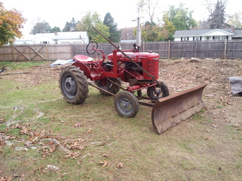 1941 Farmall A - I got the tractor painted but not the implement.