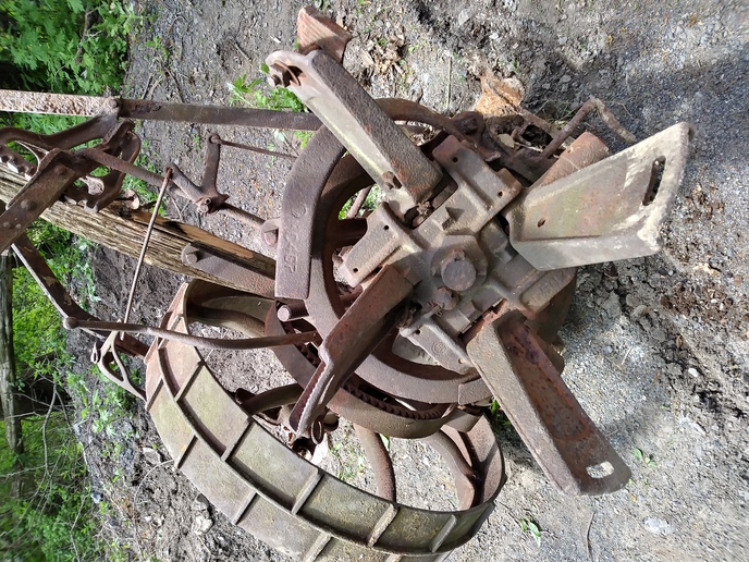 Deering Ideal, Chicago - This has been sitting in a ditch on recently  purchased property near Tillson, NY. There was a  metal seat and one half of a mower blade also  recovered. I would like to know what it is, model  number, if possible, so I could find a manual and do  a partial restoration.