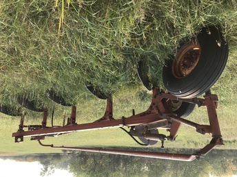 Ih 550 Moldboard Plow With Packer - 5 bottom plow with trip bottoms packer included.