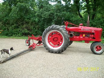Interantional Sicklebar Mower 1940S - my dad bought the farmall H and mower sometime inthe 1940's. I refurbished bothe to working condition and use them to mow under my fruit trees.  Then I wax and polish twice a year