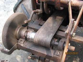 On A 1954 Allis Chalmers B - Homemade grinder from the original owner. Powered by belt pulley