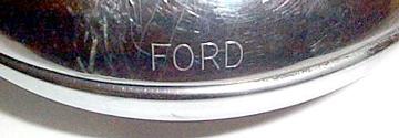 1945 2N Ford - Logo On Hall Light - This is the Ford Logo on the Hall Lamp. Mark H.