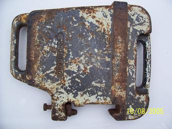 Moline Suitcase Weight? - I think this weight is a Moline weight but not sure. There is a number cast in it, 20-0007856, but not the letters 'MM'. Weighs 90lbs.
