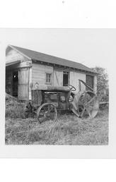 Not Known - This picture was taken in 1952. The tractor belonged to my dad. I learned to drive on it. We had a small farm and he used it to plow and to cut hay with. He rigged up a manual lift so he could lift up the plow at the end of the row.