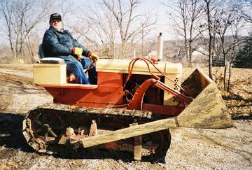 1957? Case 310 - This is a cute little dozer I picked up a few years ago. Under carrage needed to be completely rebuilt. Thats my buddy Wayne operating it.