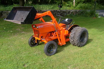 Economy Power King - Has a loader and dual rear wheels.