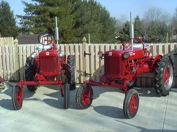 1949 And 1952 Farmall Cub - I don't what it is but these tractors are addicting. I have 4 now. 3rd generation Cub lover!