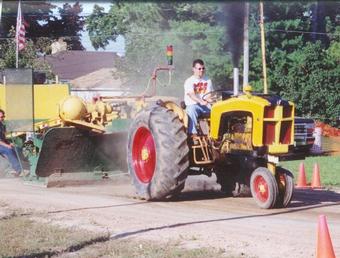 1957 Minneapolis Moline 5-Star - This is a 1957 Minneapolis Moline 5-star diesel that the family has been pulling for over 20 years. We pull in both the 5000# and 7000# hot farm classes. This particular picture is of me pulling last fall in the 5000# class with a turbo.