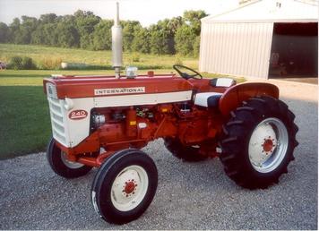 1958 International 240 Utility - This is a very nice size tractor and fun to drive. It took me about 200 hours to restore. It was in very bad shape when I found it and I had to make several parts myself.