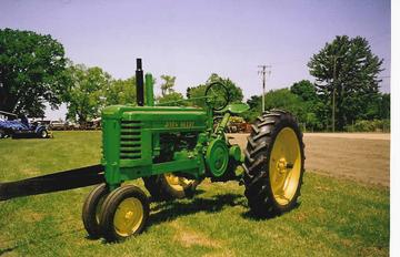 1944 John Deere B - pretty much bought the tractor the way you see it at a local auction, I use it to run my stationary baler at our tractor shows