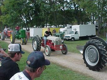 1950 Ford 8N - Here is Aunt Codra's 1 owner tractor that I restored last year at its first outting. Andys behind the wheel. don't he look happy. Thanks Jason Grooms