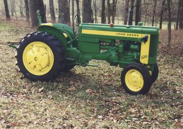 1957 John Deere 320U - Restored in 1999 and painted with undercoat/clearcoat.