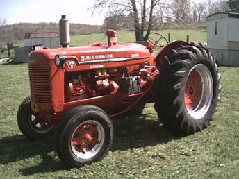 1946 McCormick Deering WD9 - I found this Tractor in a Field up to the Axles in Mud.It took 2 years to get it back all original.