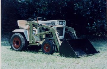 1972 Bolens Husky 1254 - This is an example of one of my medium tube frame restorations. On it I have installed a model 14 Johnson loader. It is the only loader ever made for a tube frame bolens that allowed the deck to be installed without removing the loader.