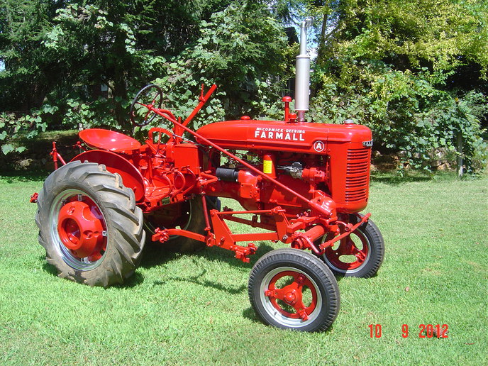 39 Farmall A W/ A-134 Cultivator - This is the first trip out of the shop after restoration. It was converted to electric start well before I got it, but it/s an early '39 (s/n 4902). Once I get the cultivator trip-units back on, she'll be ready for the fall shows.