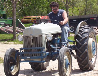 Ford 9N - My Grandfathers tractor. I know it's the wrong color but it has been blue and grey as long as we've known it. It will be repainted blue and grey.