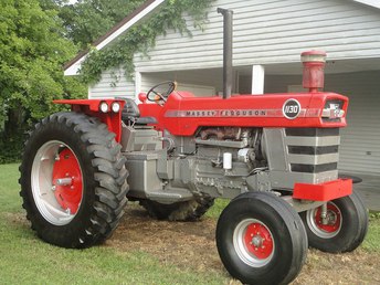 1970 Massey Ferguson 1130 - Its getting a complete engine overhaul right now and Ive added a new turbo to it and lots of other things and new tires and paint are in the future for it.  Looking for a original seat for this tractor so if anyone knows where I can find one please let me know cause the are very hard to find