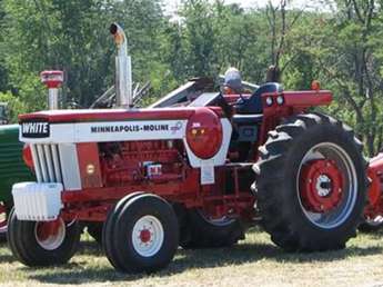 Moline G1050 - the G1050 came out of the factory 4 different paint jobs. yellow,  red for Canada, and Heritage red white and blue,green for Oliver 2055