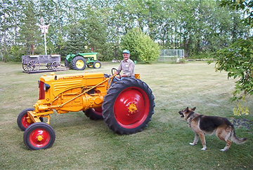 1948 Minneapolis Moline Rte - As a 4 year old I remember Dad coming home  with this brightly painted tractor and a 7  foot Massey Harris cultivator.I grew up on  it doing 100s of hours of summerfallow  with this culivator in 2nd gear.[only  power we had on 320 acre farm] Every  nut,bolt,weld is ingrained in my mind. [sorry no picture of this M.H. cultivator]