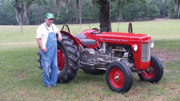 1961 Massey Ferguson 35 Deluxe - my dad and I recently restored our 1961  MF35 Deluxe and I thought we would share a  few pics with you guys, My dad and I had  had a great time doing this. this tractor  has been in the family for about 50 years.  I also want to thank yesterdays tractor  for parts and just the discussion forums  form you guys posting it help me located  parts etc. for our tractor.