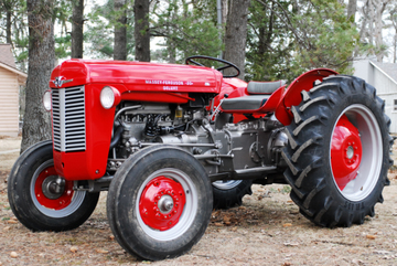 1964 Massey Ferguson Model 35 Deluxe - Exceptional tractor.  Restored to  excellent condition.  No rust on metal  body.  LESS THAN 1,400 ORIGINAL HOURS on  original Continental engine!  Starts and  runs beautifully!  New battery, exhaust,  rear rims/tires (2,100 value), carb,  ignition coil, plugs/cables, hoses,  steering wheel, seat, decals, lights,  etc.  Disassembled and professionally  painted.  Right brake is weak.  Have the  rear light in a box - never got around  to restoring.  Manual included.