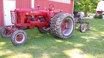 1948 Farmall M - Did some more plowing today with the M.  Had to put on the dual to get through the  wet spots.