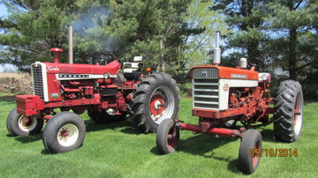 Ih Farmall 560 Gas And 1206 - Nice tractors for tractor drive or stoll around the country square.  560 still runs the auger.