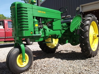 1951 John Deere MTN - Very straight tractor. Engine was stuck, I  overhauled it. Sheetmetal was as you see  it. I put a new front tire from Miller  Tire Co. The right decals from Jordes  Decals.Painted it and it looks and runs  great.
