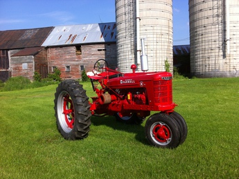 1948 Farmall H - I bought the tractor in April 2010 and knew a guy that was into restoring Farmall tractors and was able to talk him working on mine, the restoration was done in the summer of 2012