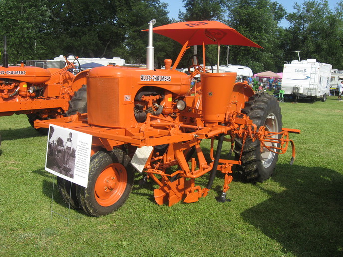 Allis Chalmers WD With Cultivator  - My dad purchased this WD new in 1951 from Hoch's Hardware in Winamac, Indiana. The cultivator and side dressers are original, and my wife and I had the WD restored in dad's memory.