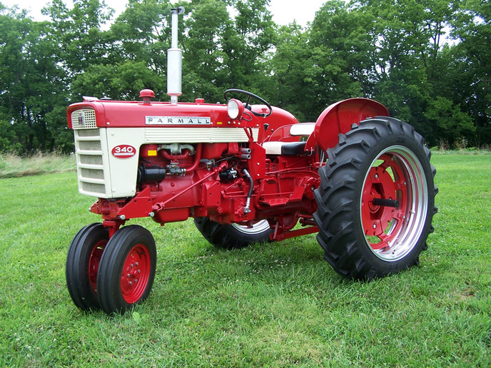 1959 Farmall 340 - This tractor was found in a barn after sitting for about 15 years. It was rusty but the sheet metal was dent free. Engine was free and runs great after major work on the gas line and tank