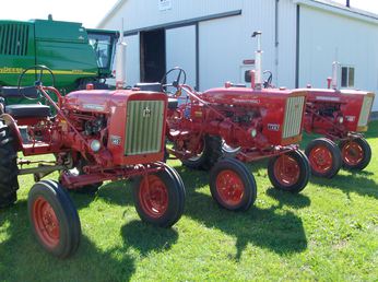 3 IH 1979     140S - One has been repainted the other two are original. The repainted one has a tack with 4000 hours on it.