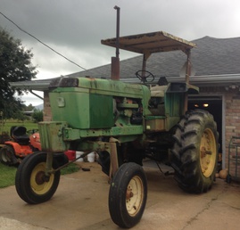 1973 John Deere 4230 High Crop - New toy wont fit in garage.   Any one know what its worth?