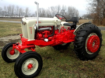 Ford 960 -      Nice, driving and handling tractor.  Well optioned with pie weights, wide  front, pwr steering and dual clutch.