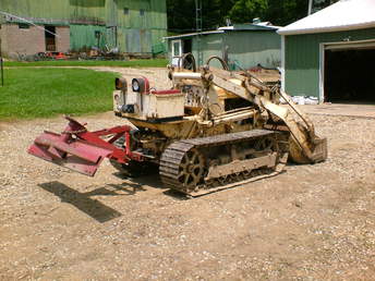 1960 Case 310 D Crawler - seemed like a good idea, but the blade doesn't weigh enough to do anything but bounce