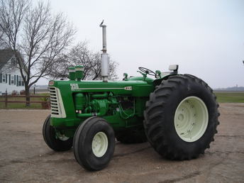 1959 Oliver 990  - This tractor was completely restored. The engine has the large air ports, with high compression pistons, a 4 valve per cylinder head, and N 70 injectors. I has had the supercharger rebuilt, all new bearings, an turning @ 2100 RPM's WOT. It has a new clutch and pressure plate, all new gauges, a new seat, two hydraulic valve outlets, and new tires all around. The rear tires are 23.1 X 34s. This is a great running a looking tractor.